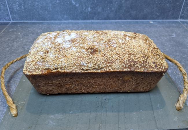 Over proofed sandwich loaf on chopping board